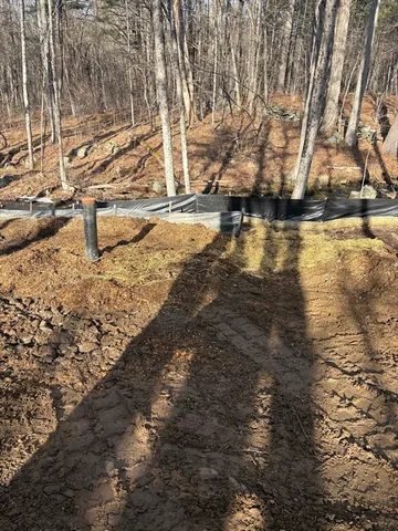 a view of swimming pool with a yard