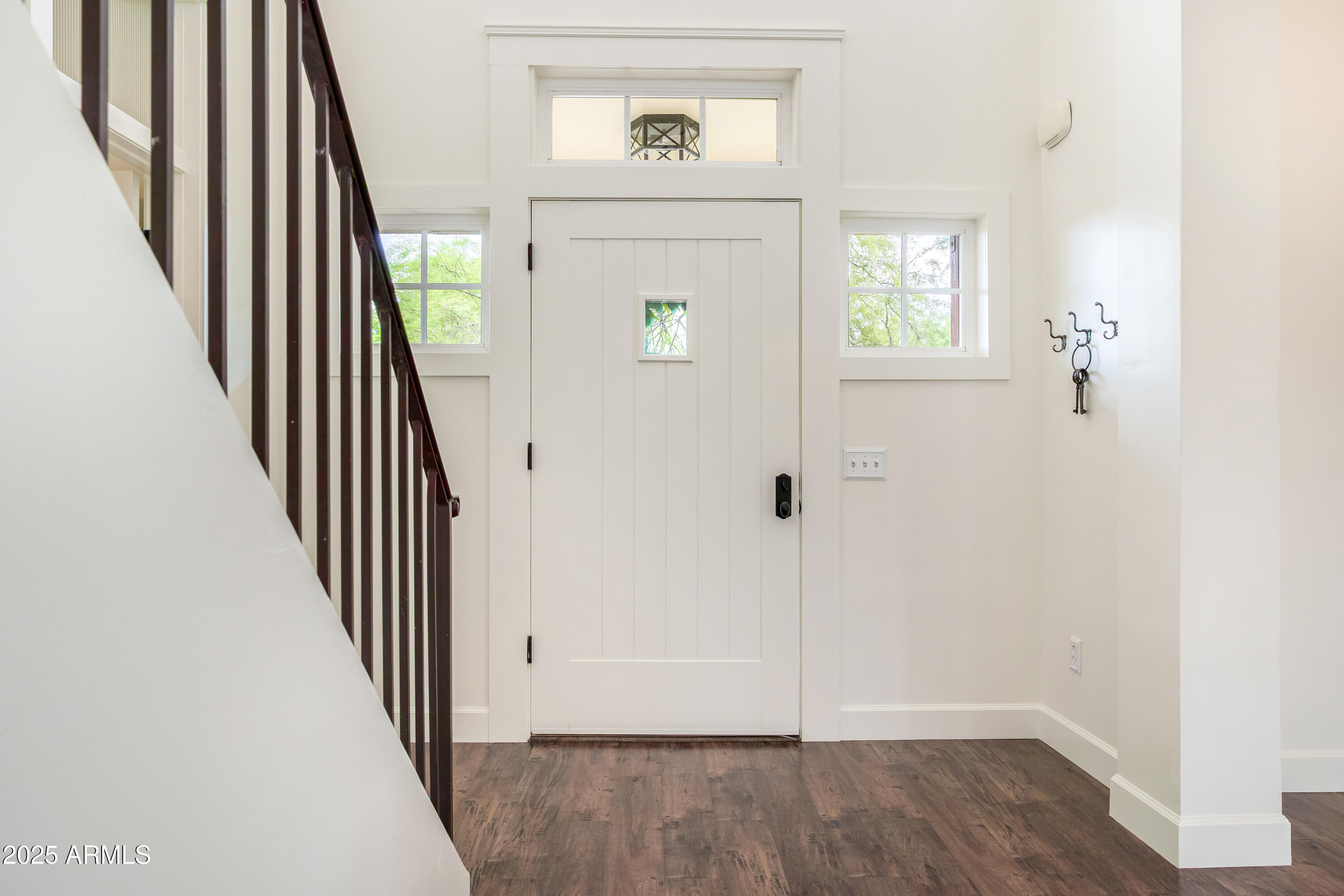 122 West Cottage Lane Tempe, AZ 85282 - Photo 5 of 43 an entryway with a livingroom and stairs