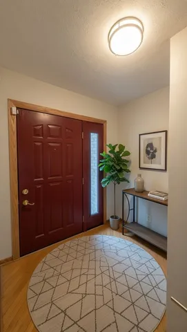 a view of a house with a yard and garage