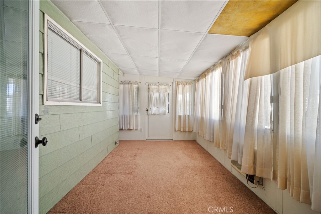 13393 Mariposa Road, Unit 169 Victorville, CA 92395 - Photo 14 of 36 a view of a big room with windows