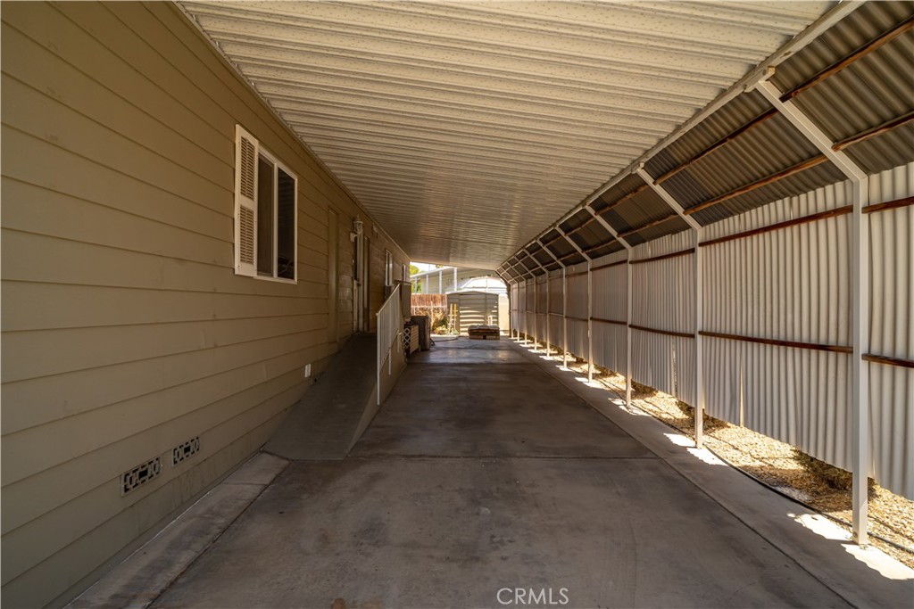 13393 Mariposa Road, Unit 169 Victorville, CA 92395 - Photo 28 of 36 a view of a garage