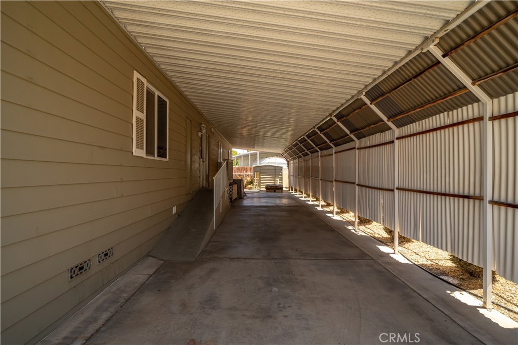 13393 Mariposa Road, Unit 169 Victorville, CA 92395 - Photo 29 of 36 a view of a garage