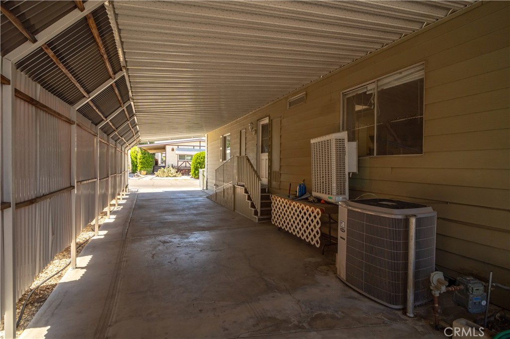 13393 Mariposa Road, Unit 169 Victorville, CA 92395 - Photo 30 of 36 a view of storage and utility room