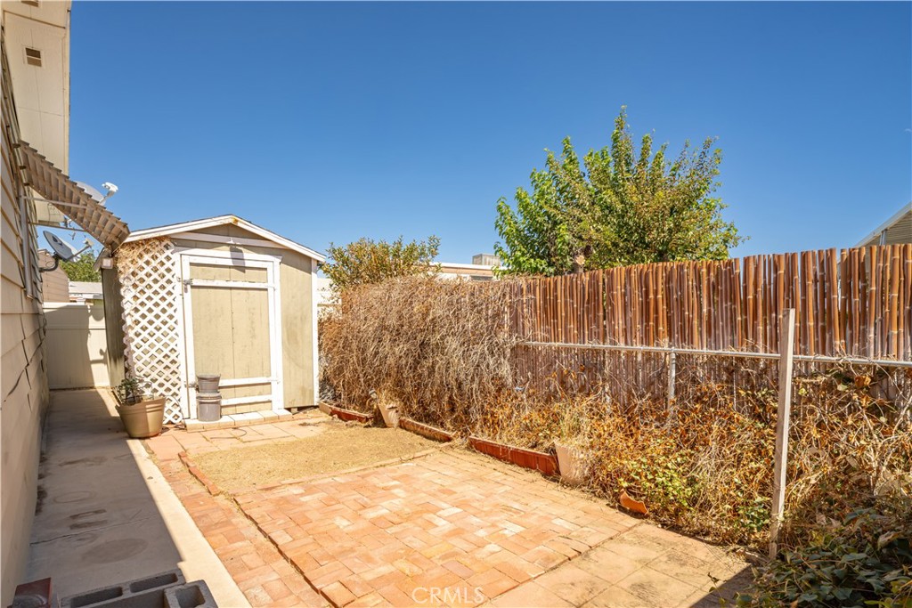 13393 Mariposa Road, Unit 169 Victorville, CA 92395 - Photo 31 of 36 a view of a backyard