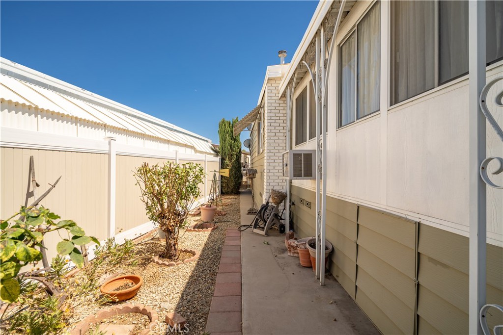 13393 Mariposa Road, Unit 169 Victorville, CA 92395 - Photo 35 of 36 a view of a balcony with furniture