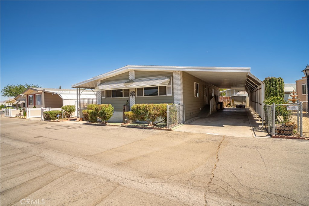 13393 Mariposa Road, Unit 169 Victorville, CA 92395 - Photo 36 of 36 a view of a car garage