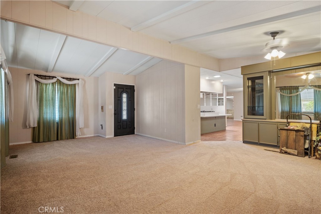 13393 Mariposa Road, Unit 169 Victorville, CA 92395 - Photo 9 of 36 a view of a kitchen with refrigerator and windows