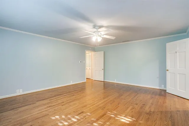 a view of entryway with stairs and wooden floor