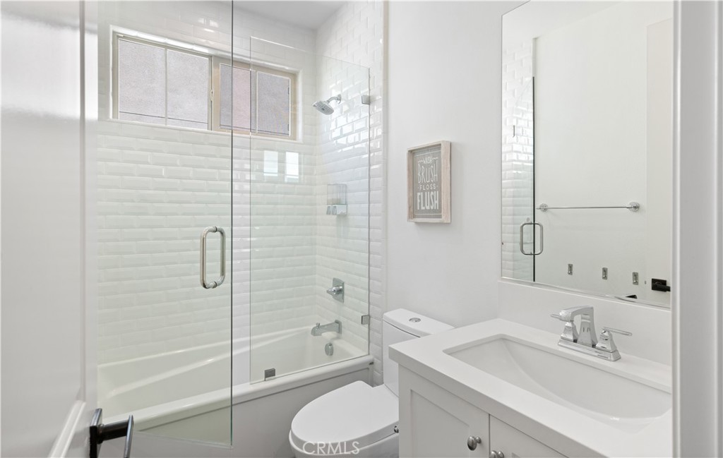 30 Windwalker Way Tustin, CA 92782 - Photo 17 of 22 a bathroom with a sink toilet and shower