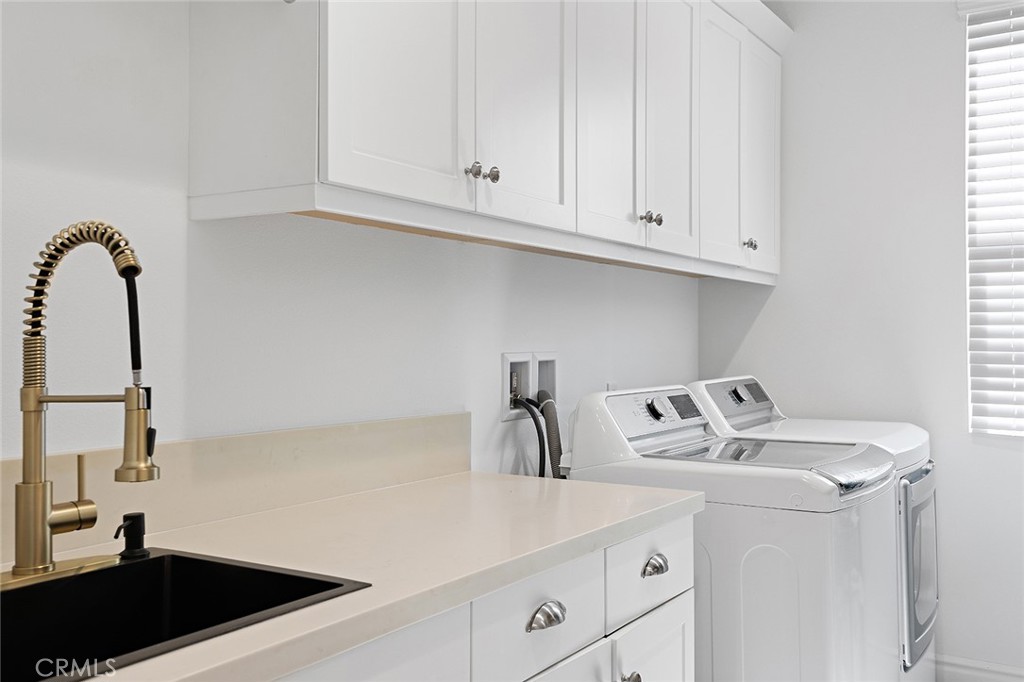 30 Windwalker Way Tustin, CA 92782 - Photo 19 of 22 a close view of sink and tap