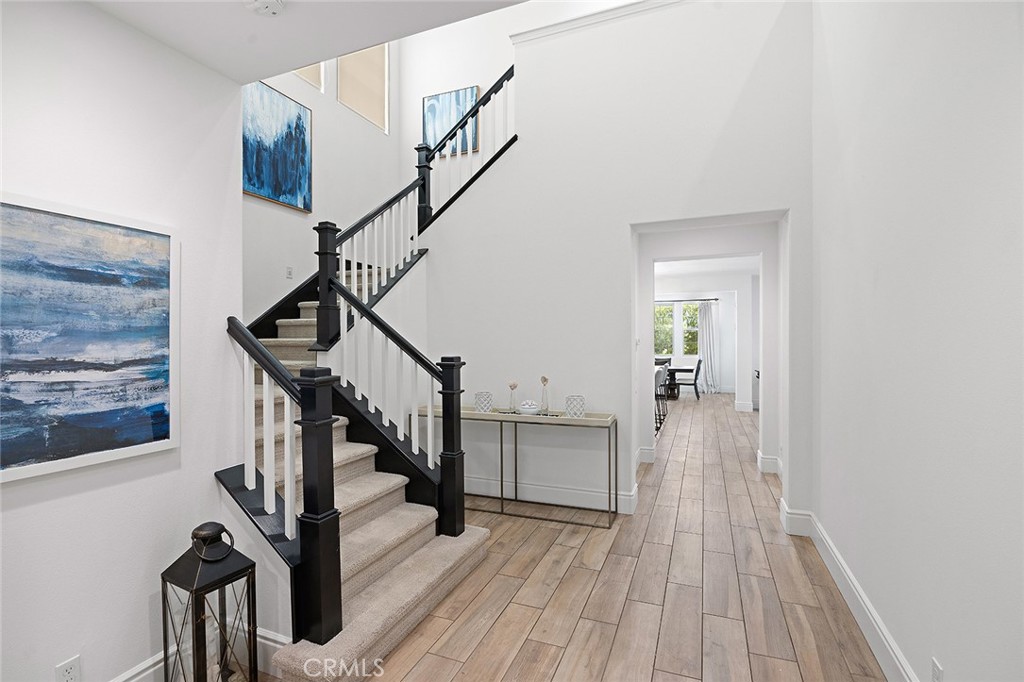 30 Windwalker Way Tustin, CA 92782 - Photo 2 of 22 a view of entryway and hall with wooden floor