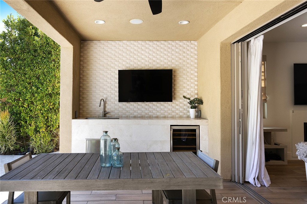 30 Windwalker Way Tustin, CA 92782 - Photo 9 of 22 a kitchen with a table and chairs in it