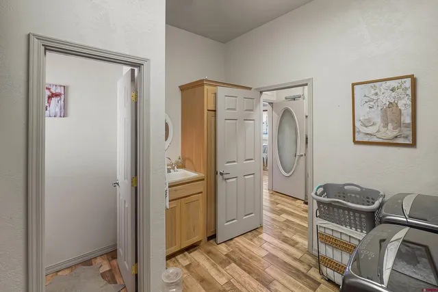 a front view of a house with a garden and patio