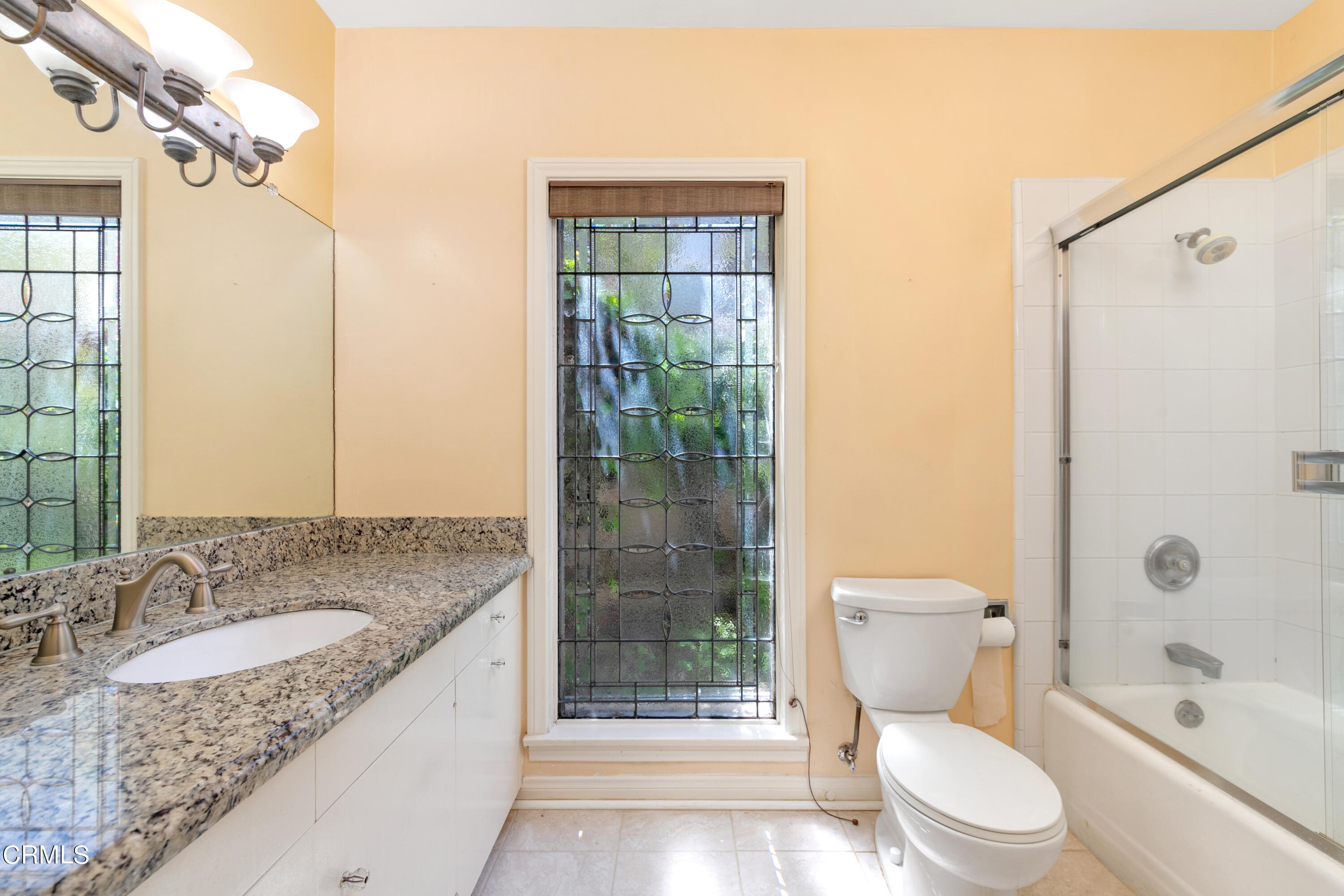 939 Old Mill Road Pasadena, CA 91108 - Photo 21 of 41 a bathroom with a granite countertop sink toilet and shower