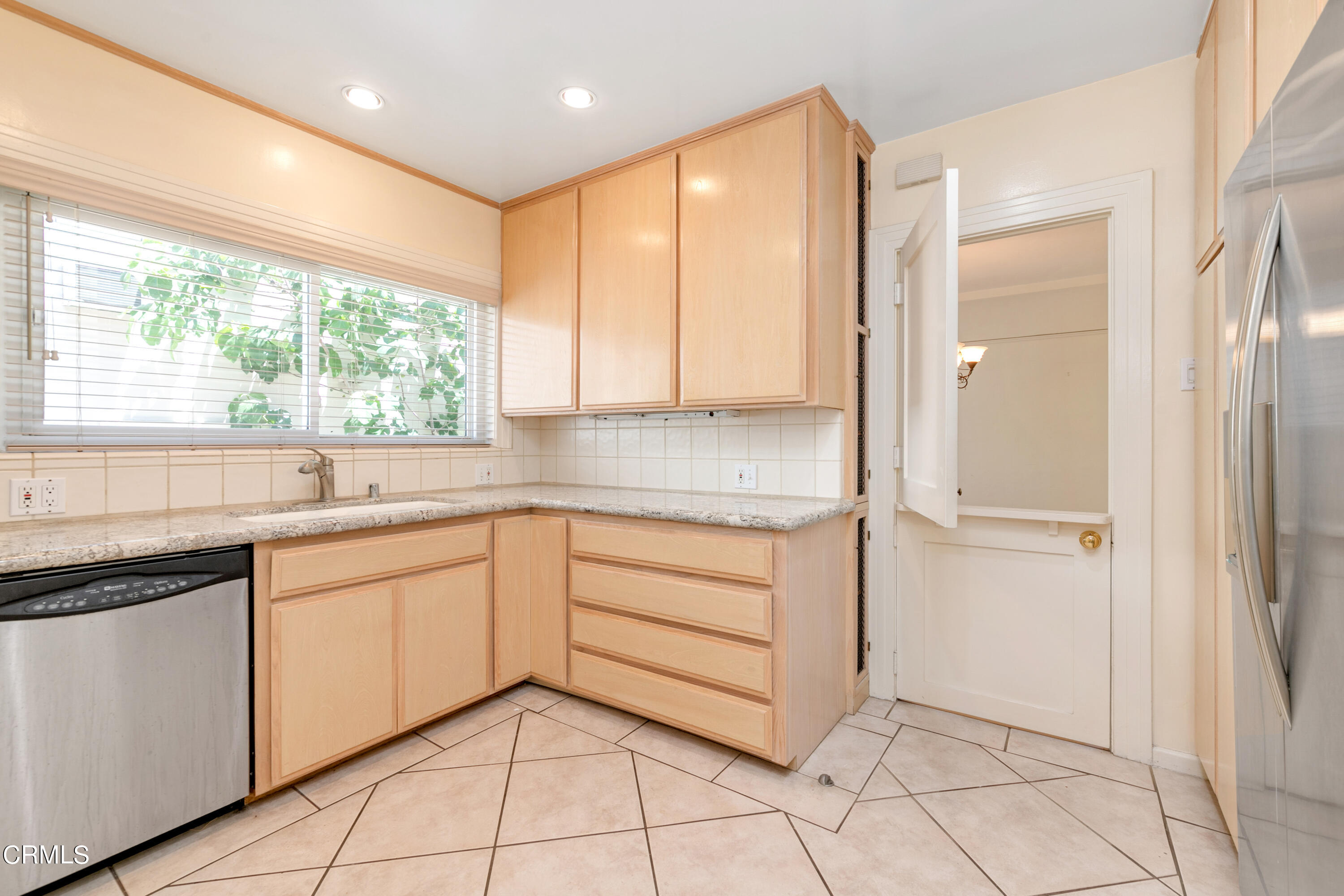 939 Old Mill Road Pasadena, CA 91108 - Photo 28 of 41 a kitchen with granite countertop white cabinets and white appliances