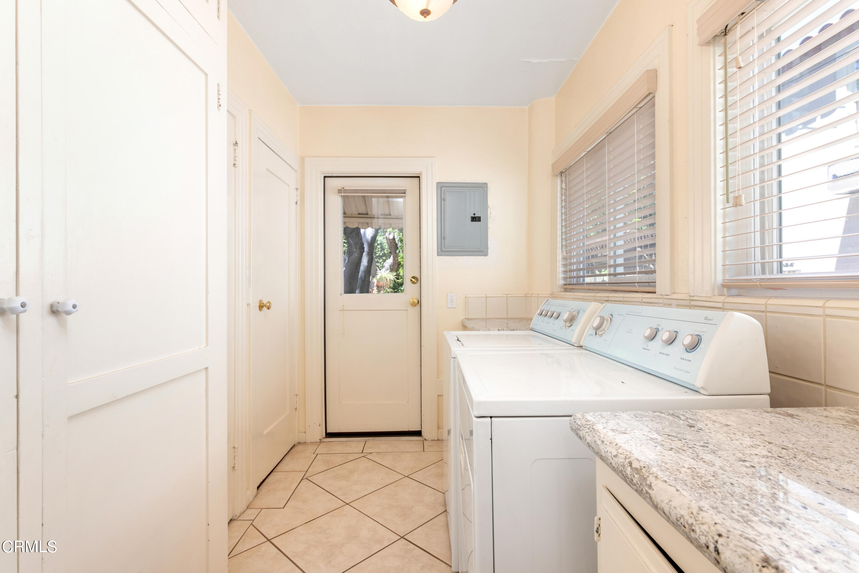 939 Old Mill Road Pasadena, CA 91108 - Photo 32 of 41 a utility room with dryer and washer