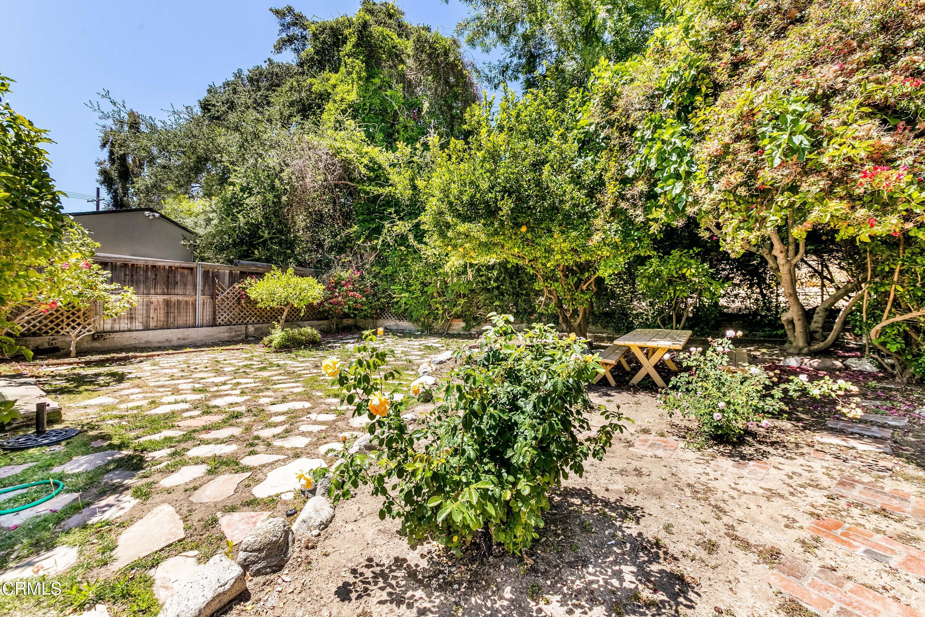 939 Old Mill Road Pasadena, CA 91108 - Photo 36 of 41 a backyard of a house with lots of green space