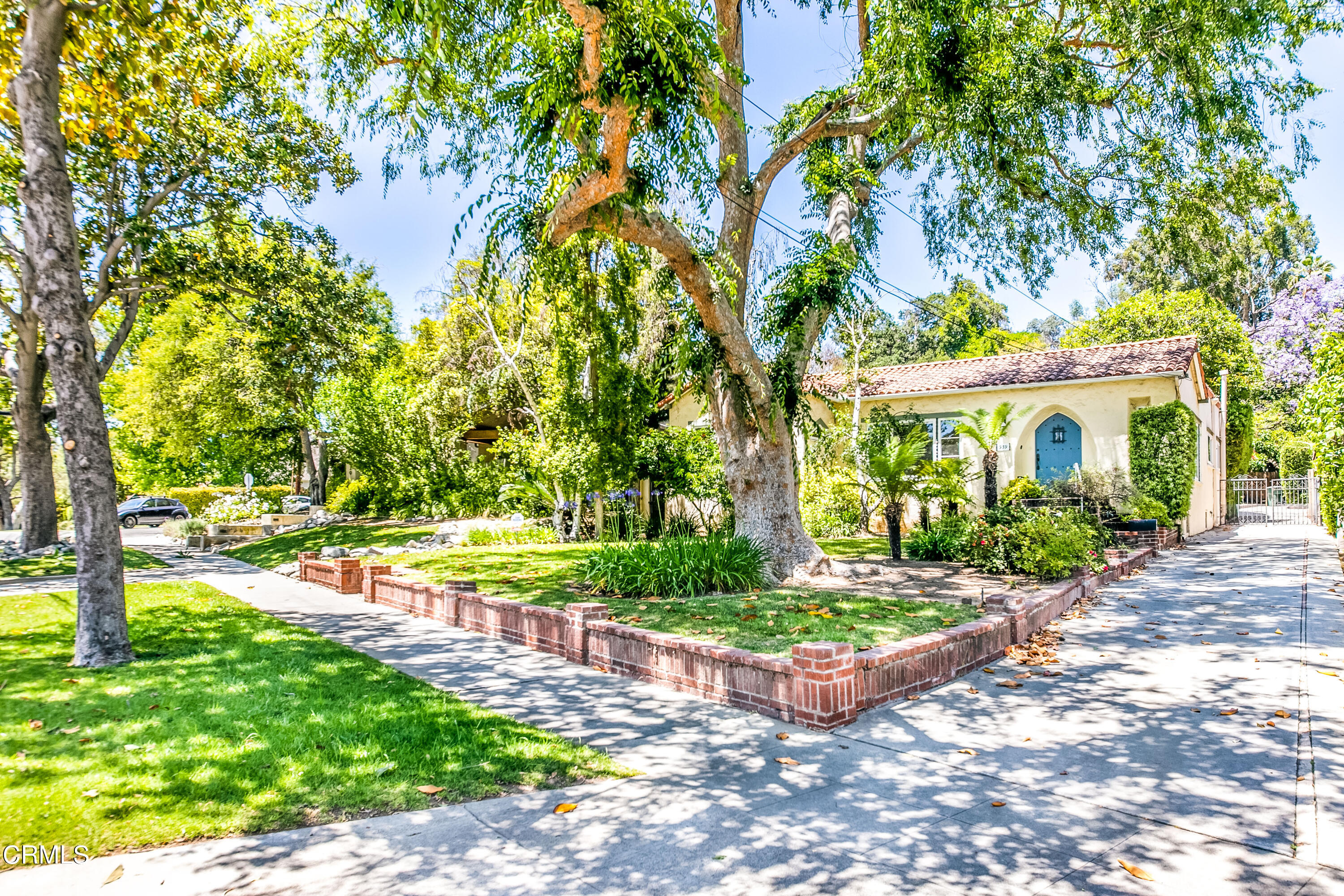 939 Old Mill Road Pasadena, CA 91108 - Photo 40 of 41 a view of a house with garden and trees