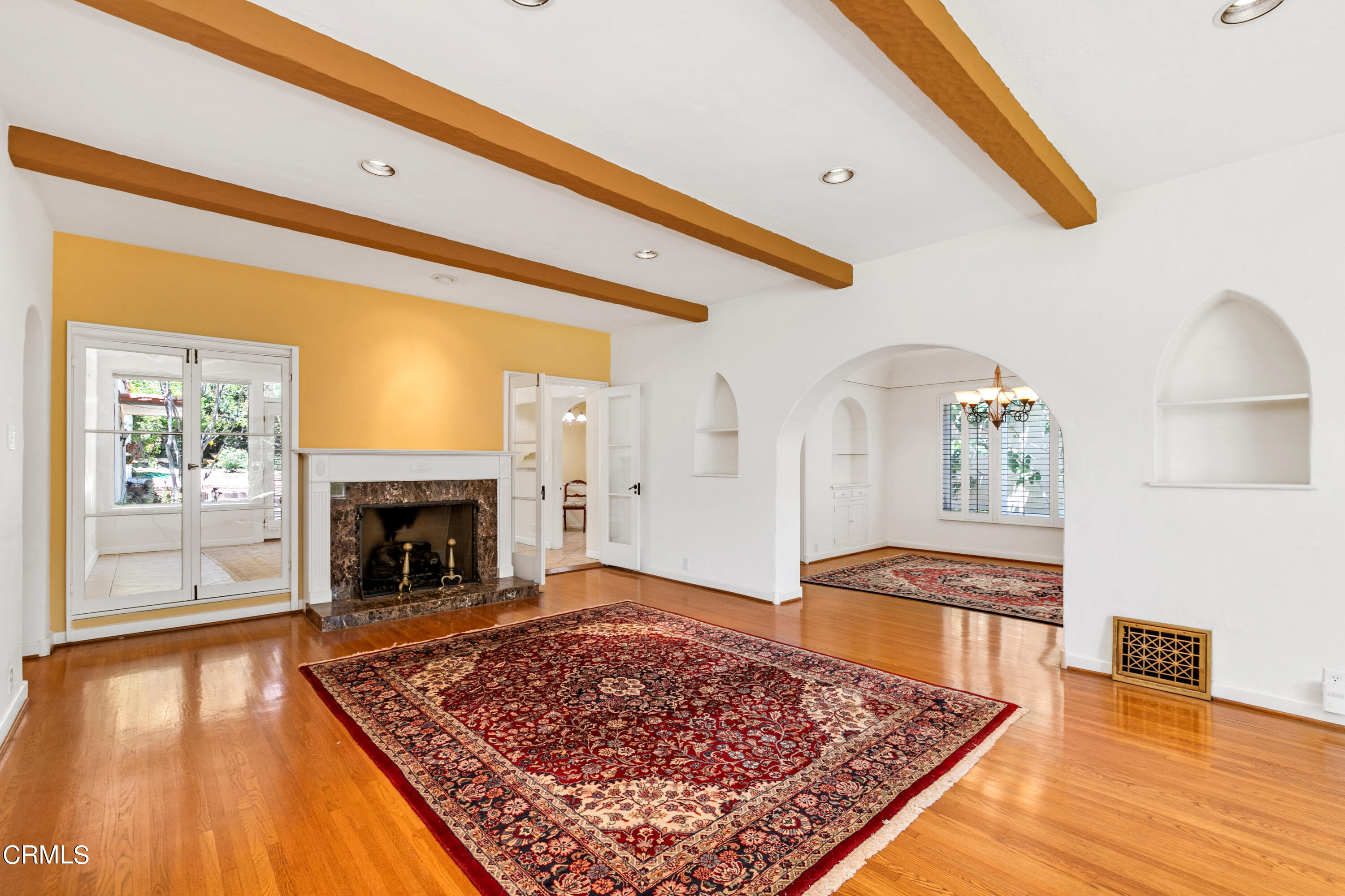 939 Old Mill Road Pasadena, CA 91108 - Photo 9 of 41 a living room with furniture and a fireplace
