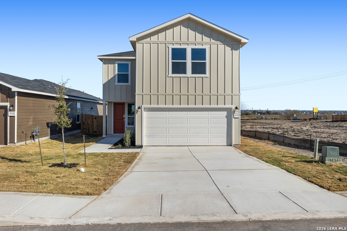 10045 Jagger Avenue Converse, TX 78109 - Photo 4 of 28 a front view of a house with entertaining space
