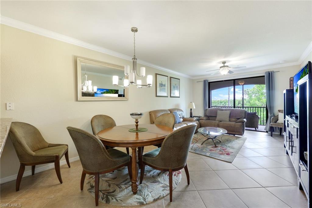 Undisclosed Address Naples, FL 34113 - Photo 10 of 24 a view of a livingroom and dining room