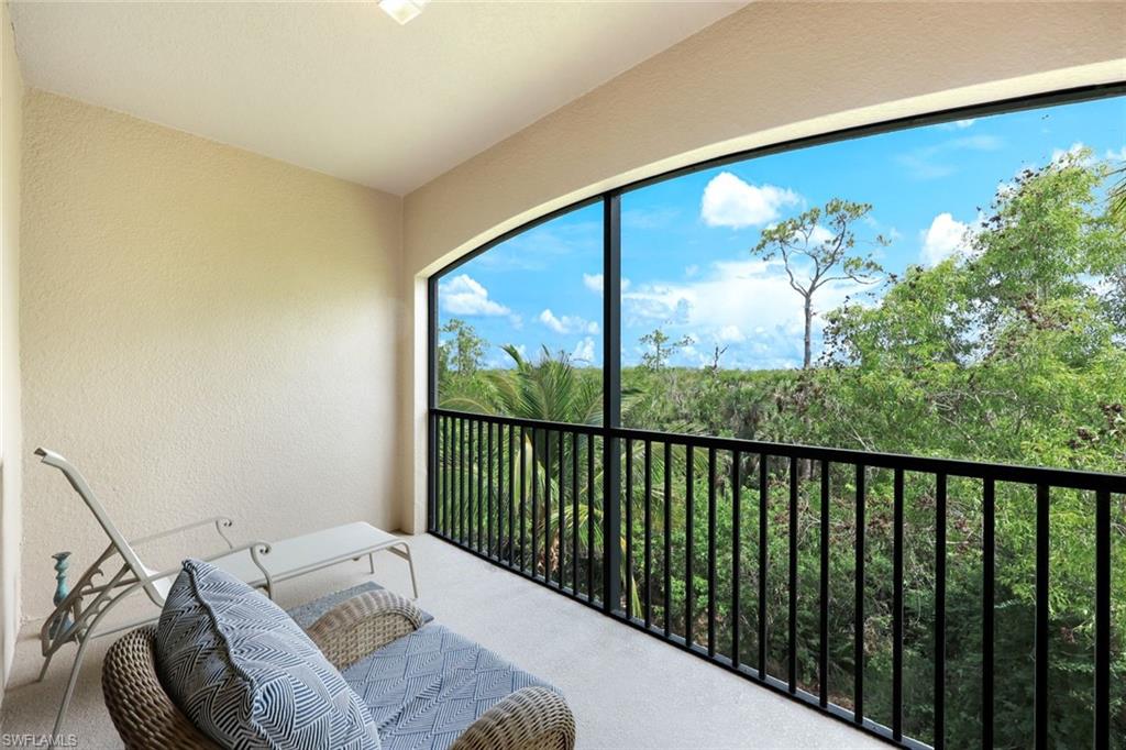 Undisclosed Address Naples, FL 34113 - Photo 18 of 24 a view of a balcony with furniture