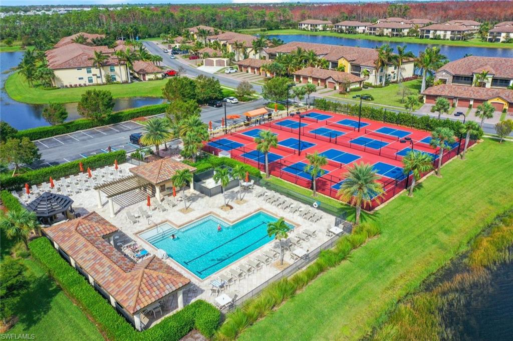 Undisclosed Address Naples, FL 34113 - Photo 21 of 24 an aerial view of a city