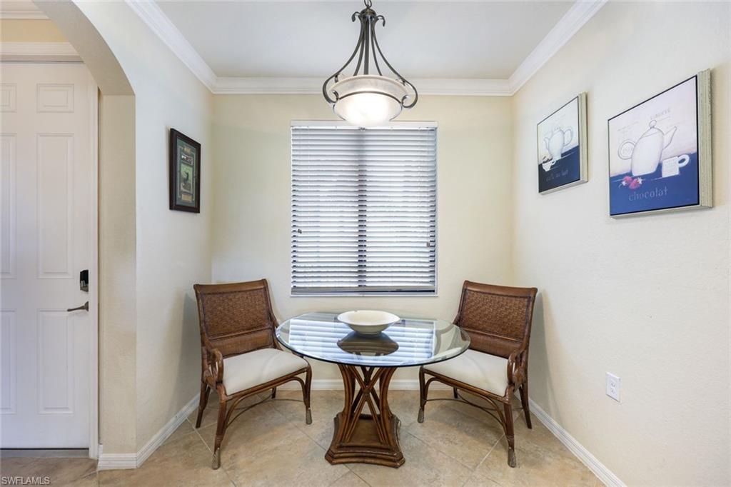 Undisclosed Address Naples, FL 34113 - Photo 9 of 24 a workspace room with furniture and windows