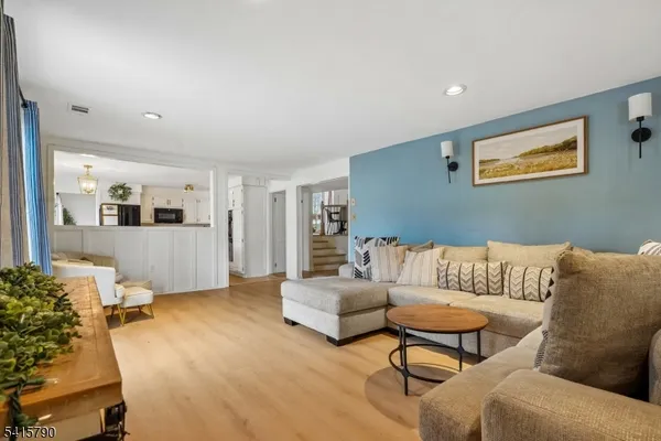 a living room with furniture and a couch
