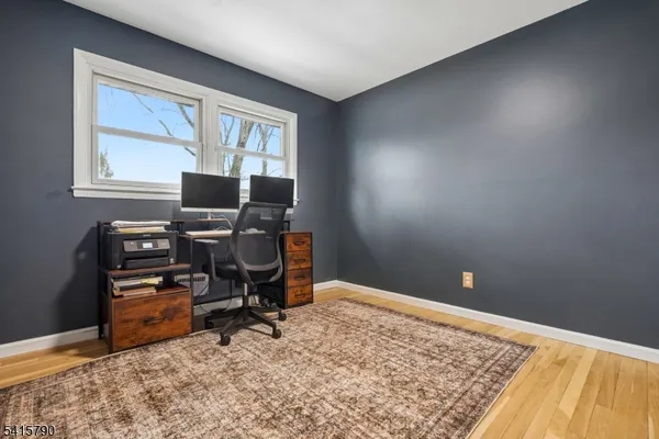a bathroom with a double vanity sink mirror and toilet