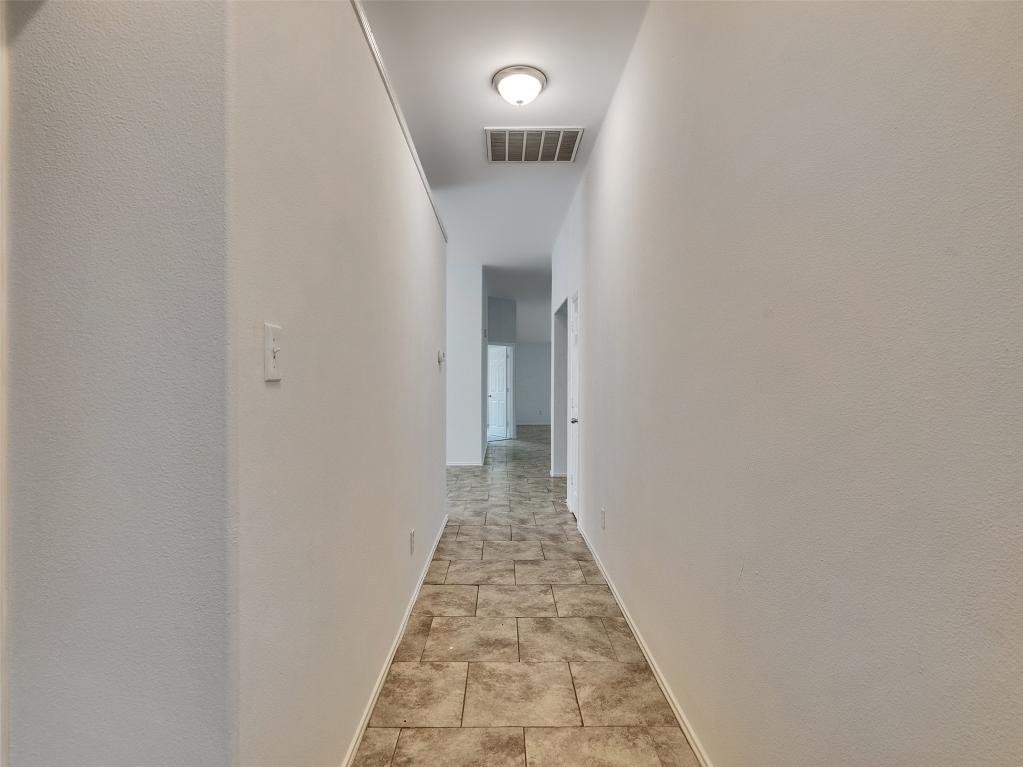 13431 Rural Oak Street Houston, TX 77034 - Photo 4 of 24 a view of a hallway with a white walls