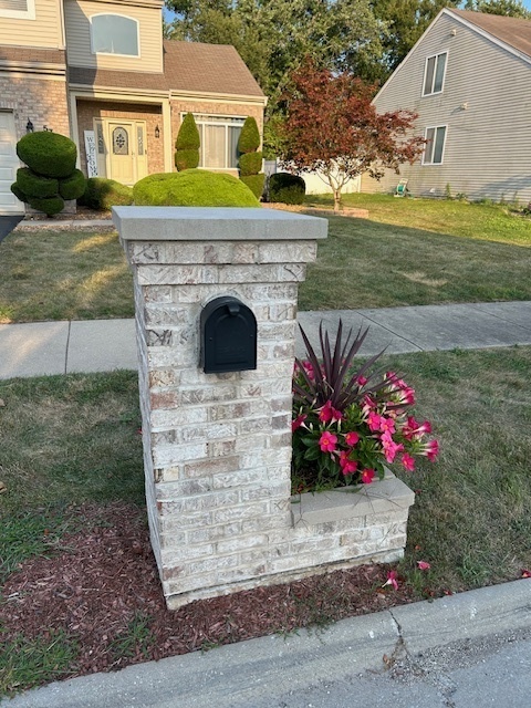 57 Sundance Road Matteson, IL 60443 - Photo 3 of 33 a view of a house with a yard and garden