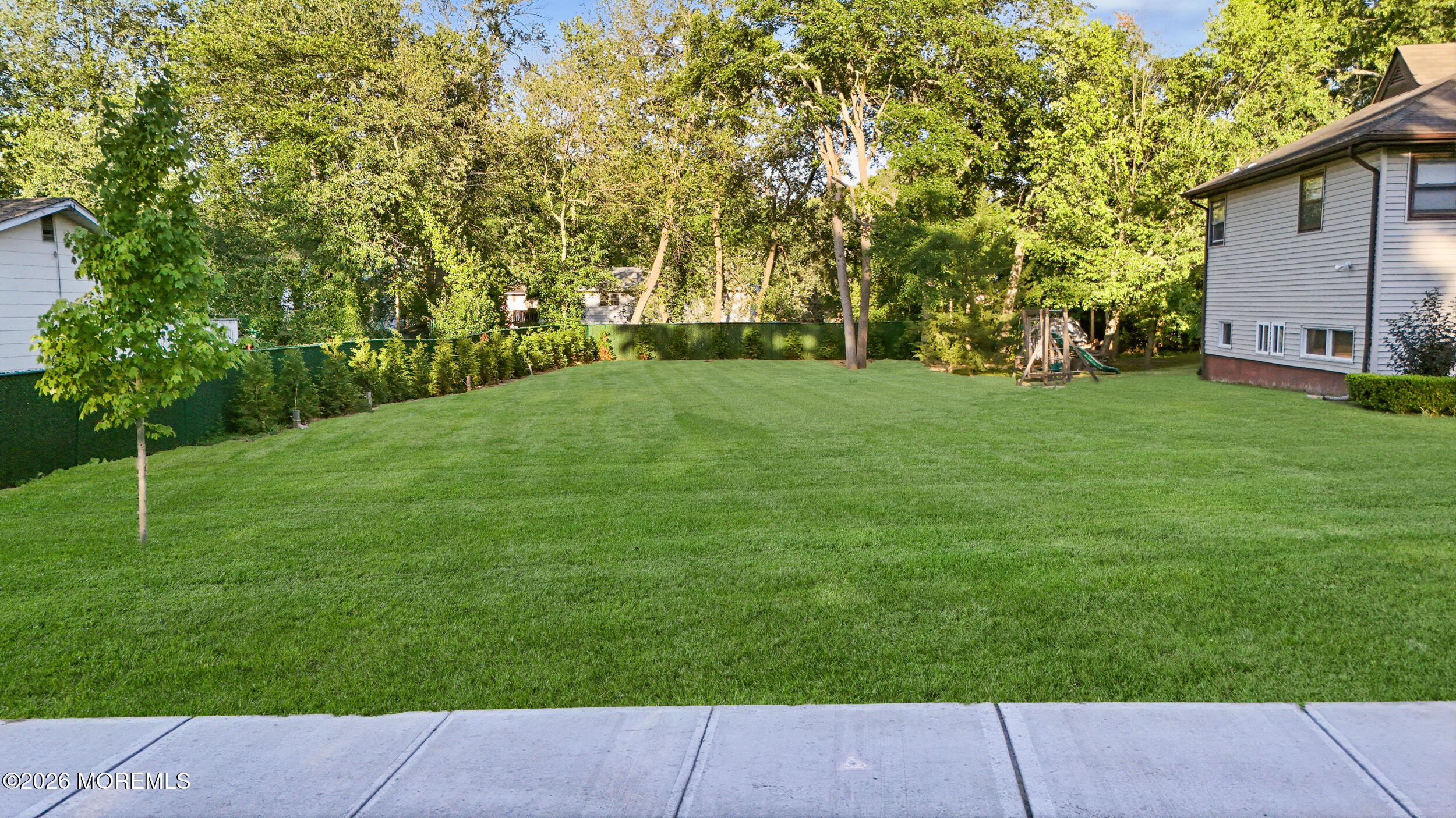 41 Sunset Road Lakewood, NJ 08701 - Photo 2 of 8 a view of backyard with green space