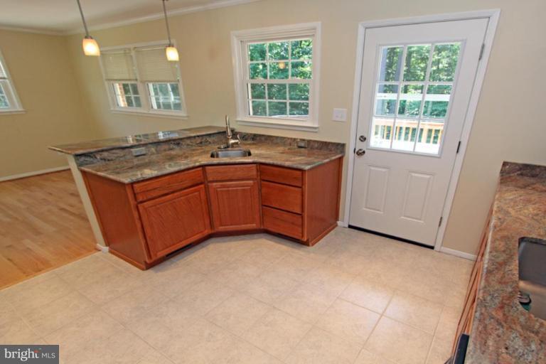 5646 Inverchapel Road Springfield, VA 22151 - Photo 14 of 30 Extra Sink with Second Disposal & Ceramic Tile