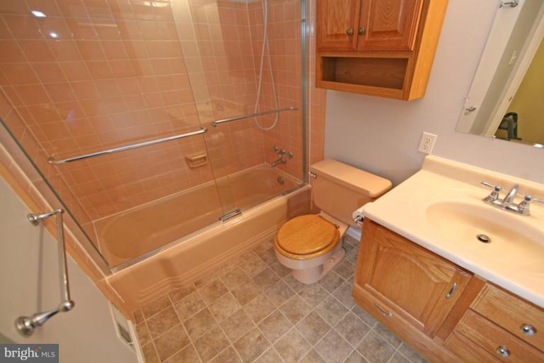 5646 Inverchapel Road Springfield, VA 22151 - Photo 23 of 30 Updated Vanity, Cabinets, Lighting, & Ceramic Tile