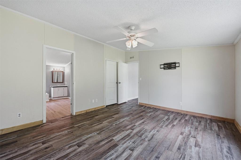150 Gilbreath Road Sadler, TX 76264 - Photo 26 of 34 a view of empty room with wooden floor