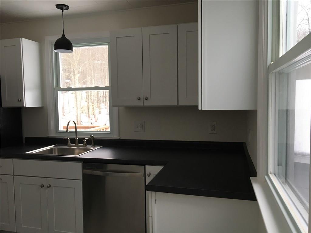 508 South Union Road Union, ME 04862 - Photo 5 of 24 Sunlit kitchen with lots of cabinets...