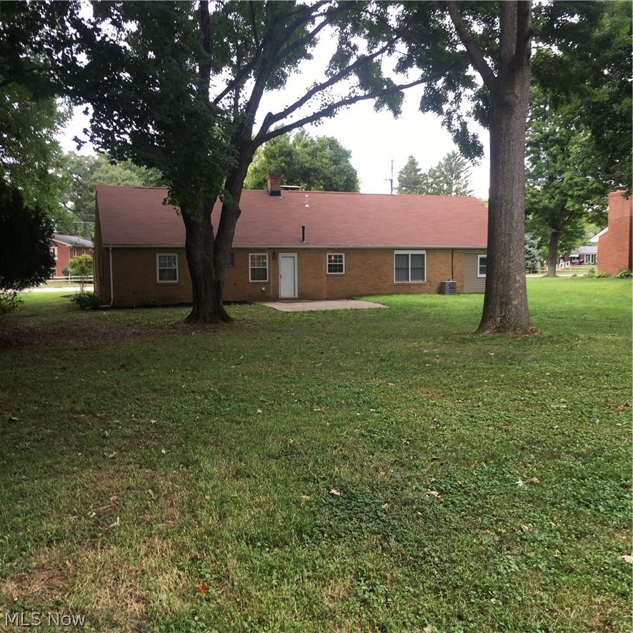 616 Everhard Road Southwest North Canton, OH 44709 - Photo 16 of 18 Spacious backyard is surrounded by lots of mature trees, and room for everyone.
