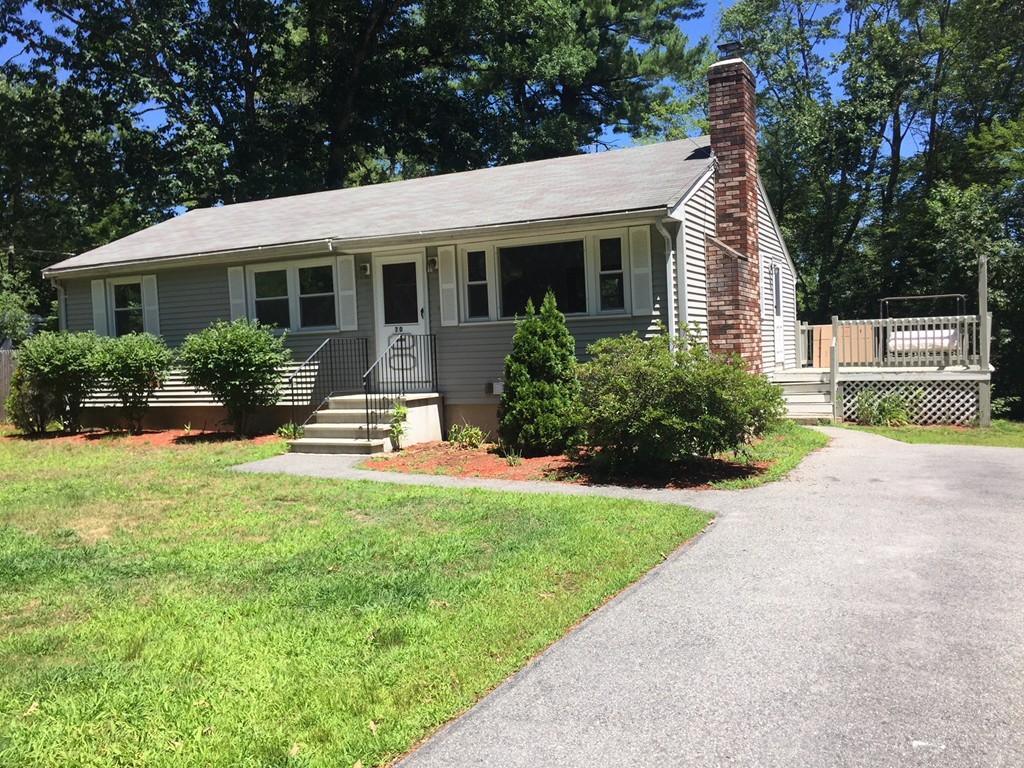70 Bellflower Road Billerica, MA 01821 - Photo 2 of 23 a front view of house with yard and green space