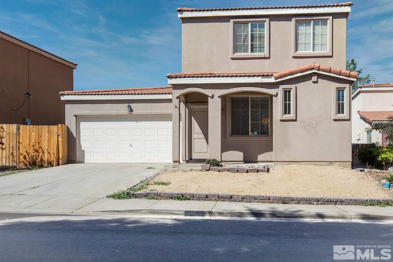 9765 Meadowstar Drive Reno, NV 89506 - Photo 1 of 21 a view of a house with a chandeliers