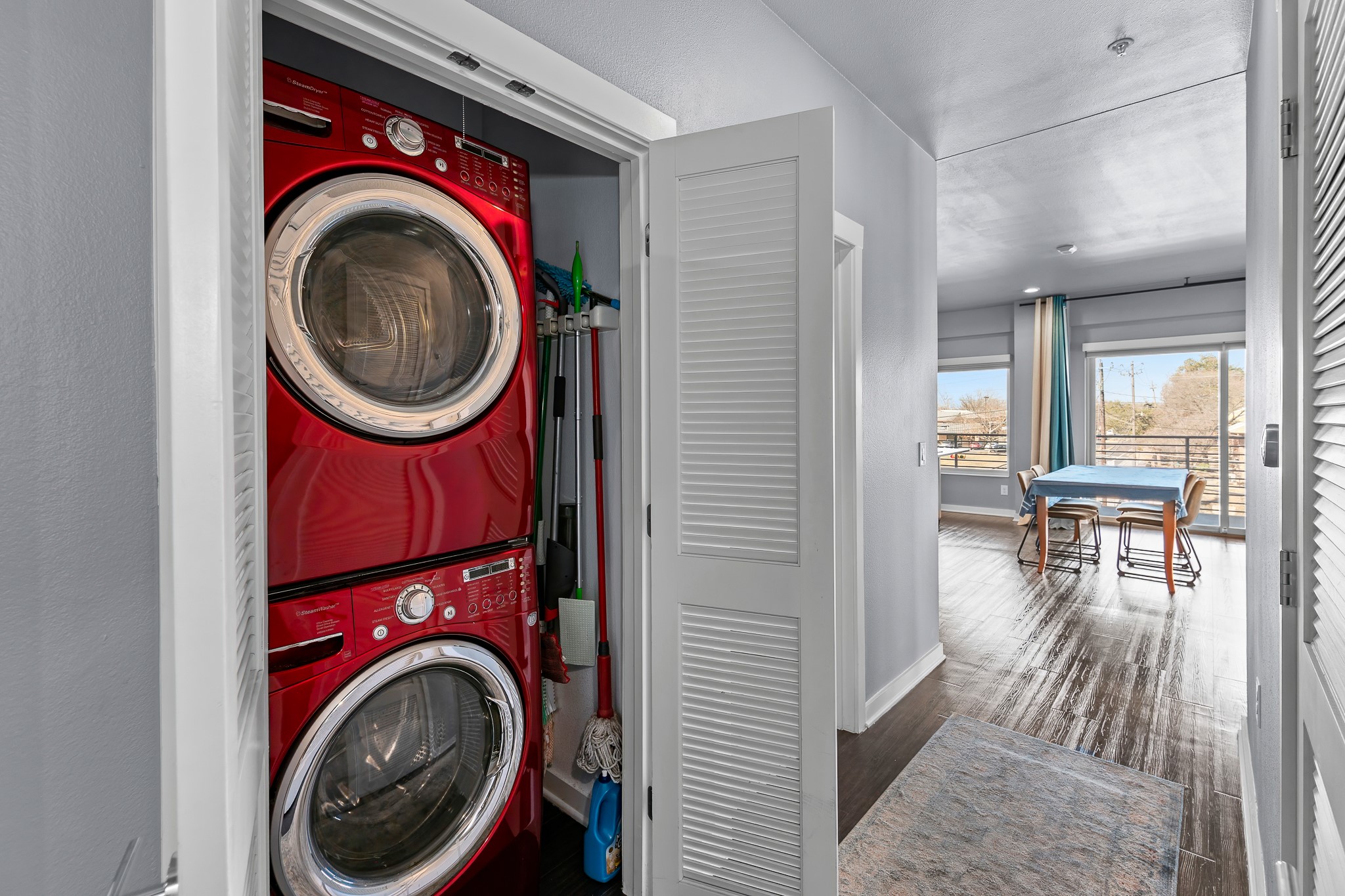 4361 South Congress Avenue, Unit 301 Austin, TX 78745 - Photo 20 of 40 a view of a hallway with washer and dryer