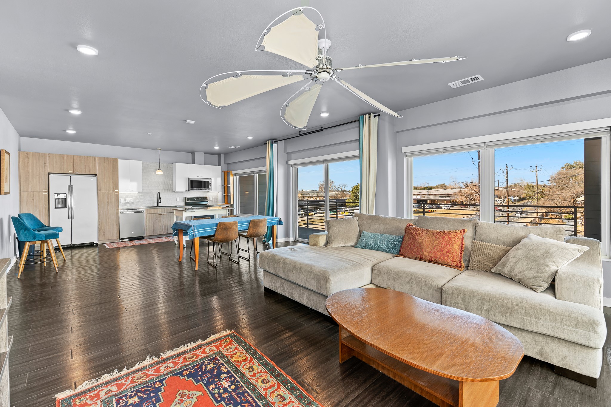 4361 South Congress Avenue, Unit 301 Austin, TX 78745 - Photo 3 of 40 a living room with furniture and a large window
