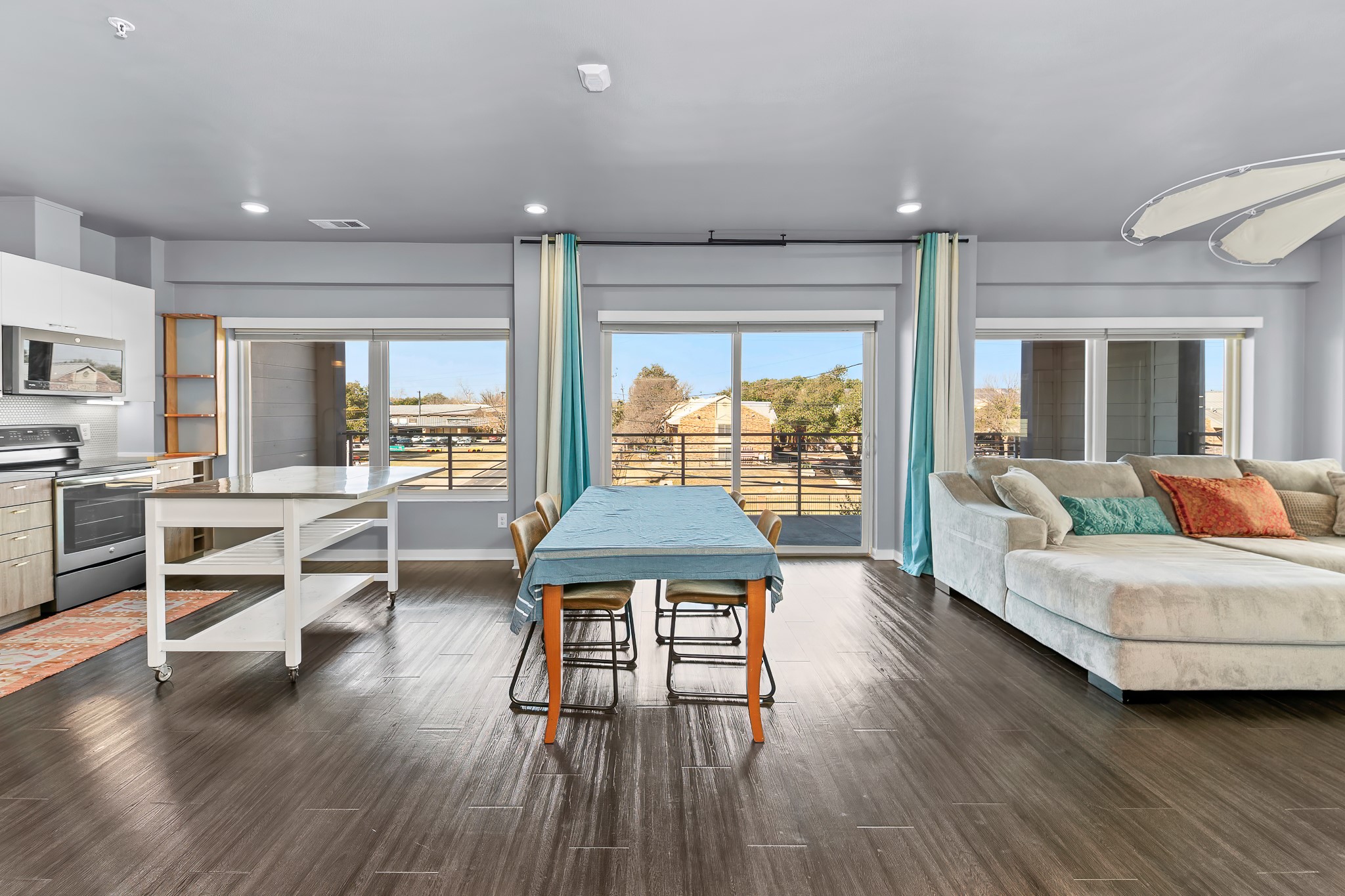 4361 South Congress Avenue, Unit 301 Austin, TX 78745 - Photo 7 of 40 a living room with furniture and a table