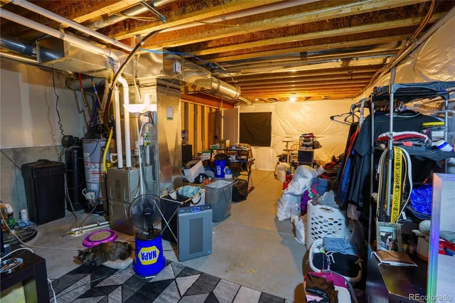 a view of a storage room with furniture and toys