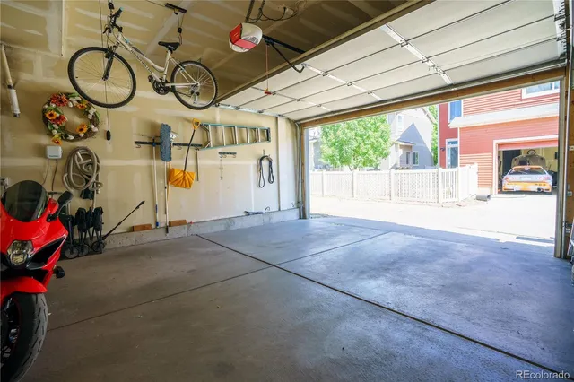 a view of a room with swing and windows