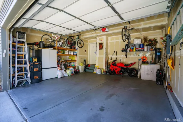 a view of a storage room with utility and racks