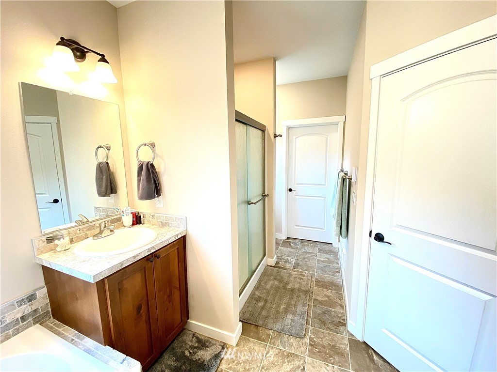22004 Lee Road Southwest Centralia, WA 98531 - Photo 17 of 26 a bathroom with a sink and a mirror