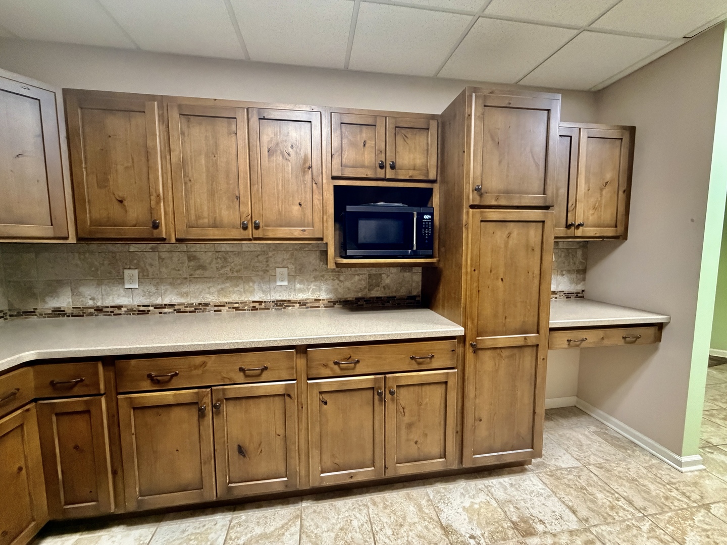 2123 North Avenue Metropolis, IL 62960 - Photo 23 of 49 a kitchen with stainless steel appliances granite countertop a refrigerator and cabinets