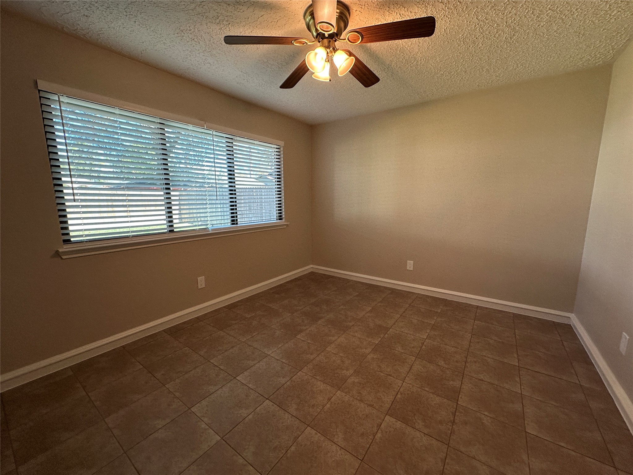 13402 Nevermore Drive Cypress, TX 77429 - Photo 16 of 33 a view of an empty room with a window