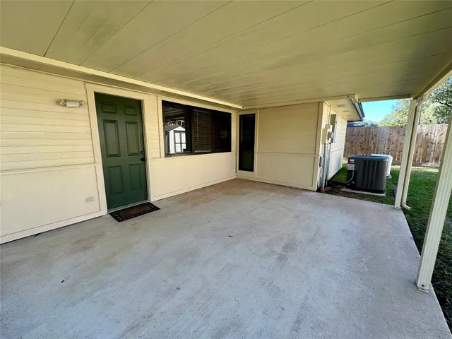 a view of a backyard with a tub